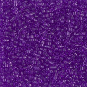 Close-up of numerous small purple beads with alphanumeric characters.