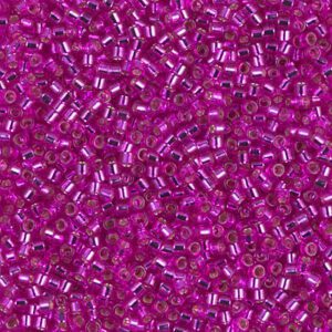 Close-up of numerous small, shiny pink beads.