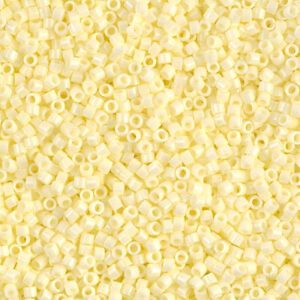 Close-up of small, pale yellow beads densely packed together.