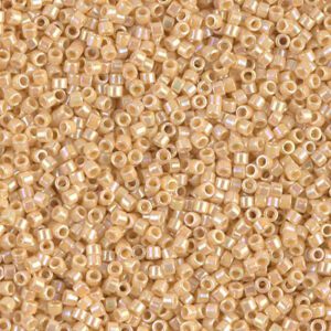 Close-up of small, tan-colored cylindrical beads.