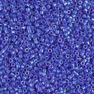 Close-up of small, translucent blue beads scattered densely.