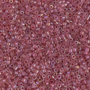 Close-up of small pinkish-purple beads with a shiny surface.
