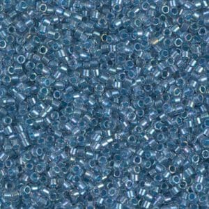 Iridescent pale blue seed beads texture