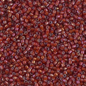 Close-up of numerous small, reddish-brown beads.