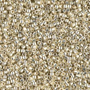 Close-up of small metallic beads with holes.