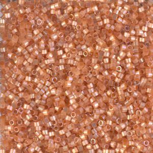 Close-up of small, shiny copper-colored beads.