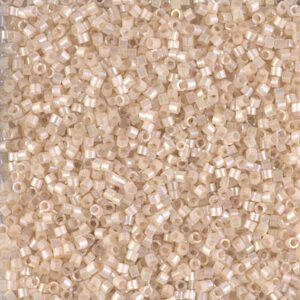 Close-up of beige and cream textured surface resembling small pebbles.