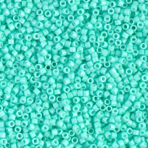 Close-up of numerous small turquoise beads.