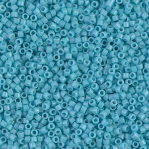 A close-up of numerous small turquoise beads.