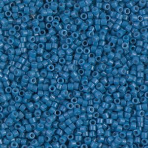 Close-up of small blue plastic beads packed tightly together.