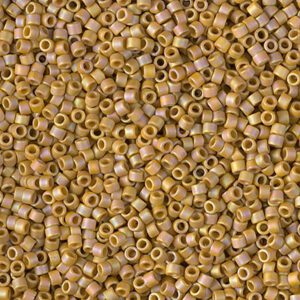 Close-up of numerous small golden cylindrical beads.