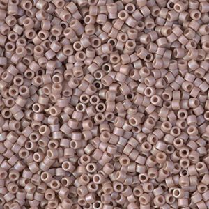 Close-up of small, round, mauve beads.
