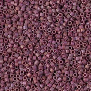 Close-up of small, purple cylindrical beads clustered together.