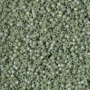 Close-up of small, pale green seed beads.