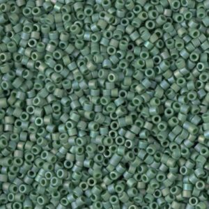 Close-up of small green seed beads densely packed.