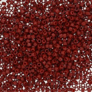 Close-up of small red beads scattered densely.