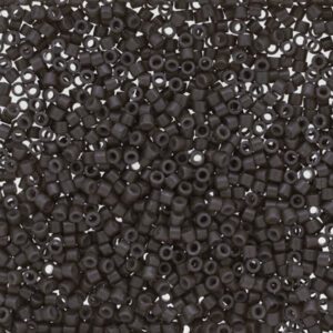 Close-up of numerous small black plastic beads.