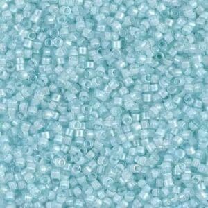 Close-up of tiny translucent blue beads.