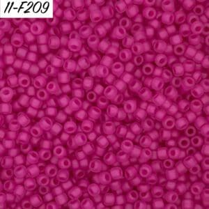 Close-up of small, magenta-colored beads densely packed together.