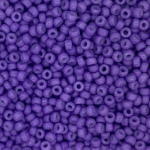 Close-up of small purple beads clustered together.