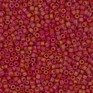 Close-up of small red cylindrical beads.