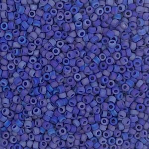Close-up of small blue cylindrical beads.