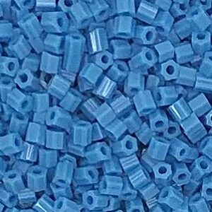 Blue plastic beads with hexagonal holes.