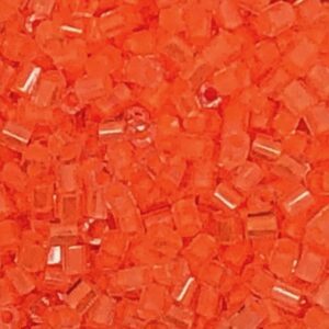 Red plastic pellets, close-up view.