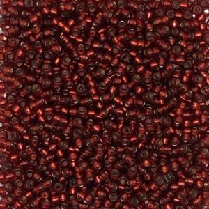 Close-up of numerous small red beads.