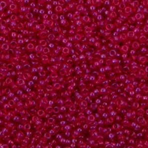 Red seed beads densely scattered in view.