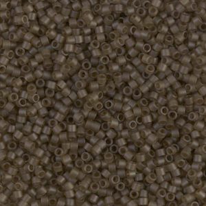 Brown microbeads scattered in close-up view.
